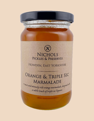 A jar of orange and triple sec marmalade from Nichols Pickles & Preserves.